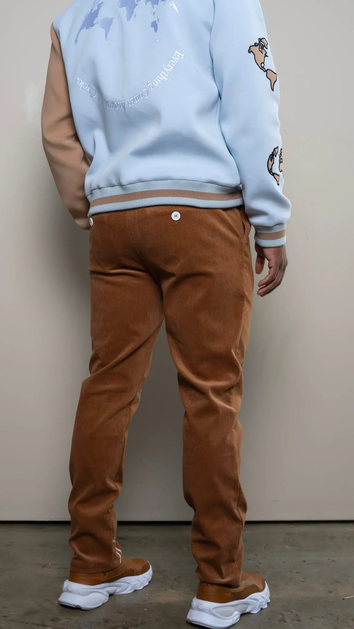 Photo of model in the Arius Juan NY vs NY Corduroy Pants posing for product picture.