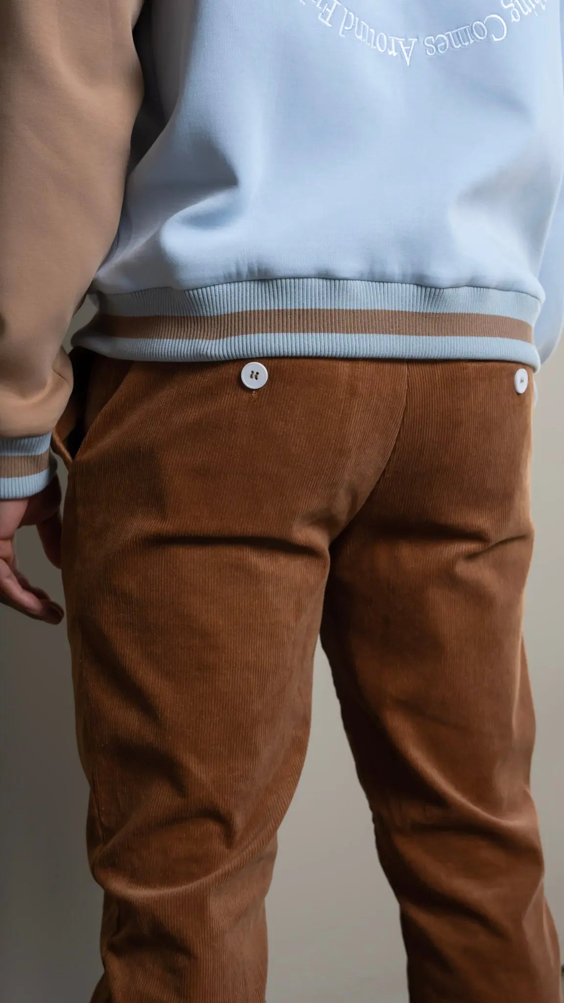 Photo of model in the Arius Juan NY vs NY Corduroy Pants posing for product picture.