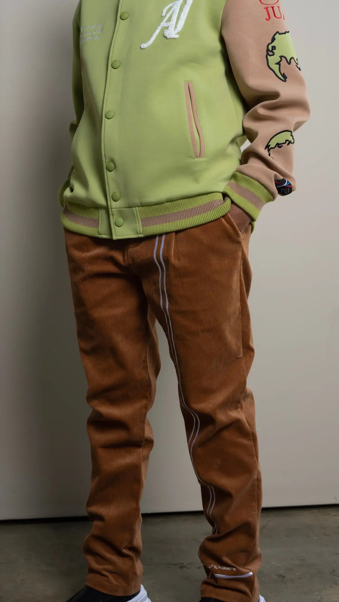 Photo of model in the Arius Juan NY vs NY Corduroy Pants posing for product picture.
