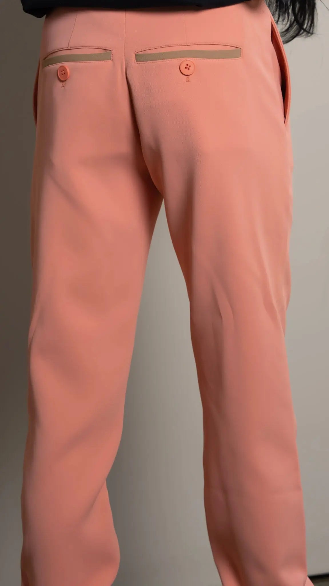Photo of model in the Arius Juan Nature's Gift: Salmon Pink Pants posing for product picture.