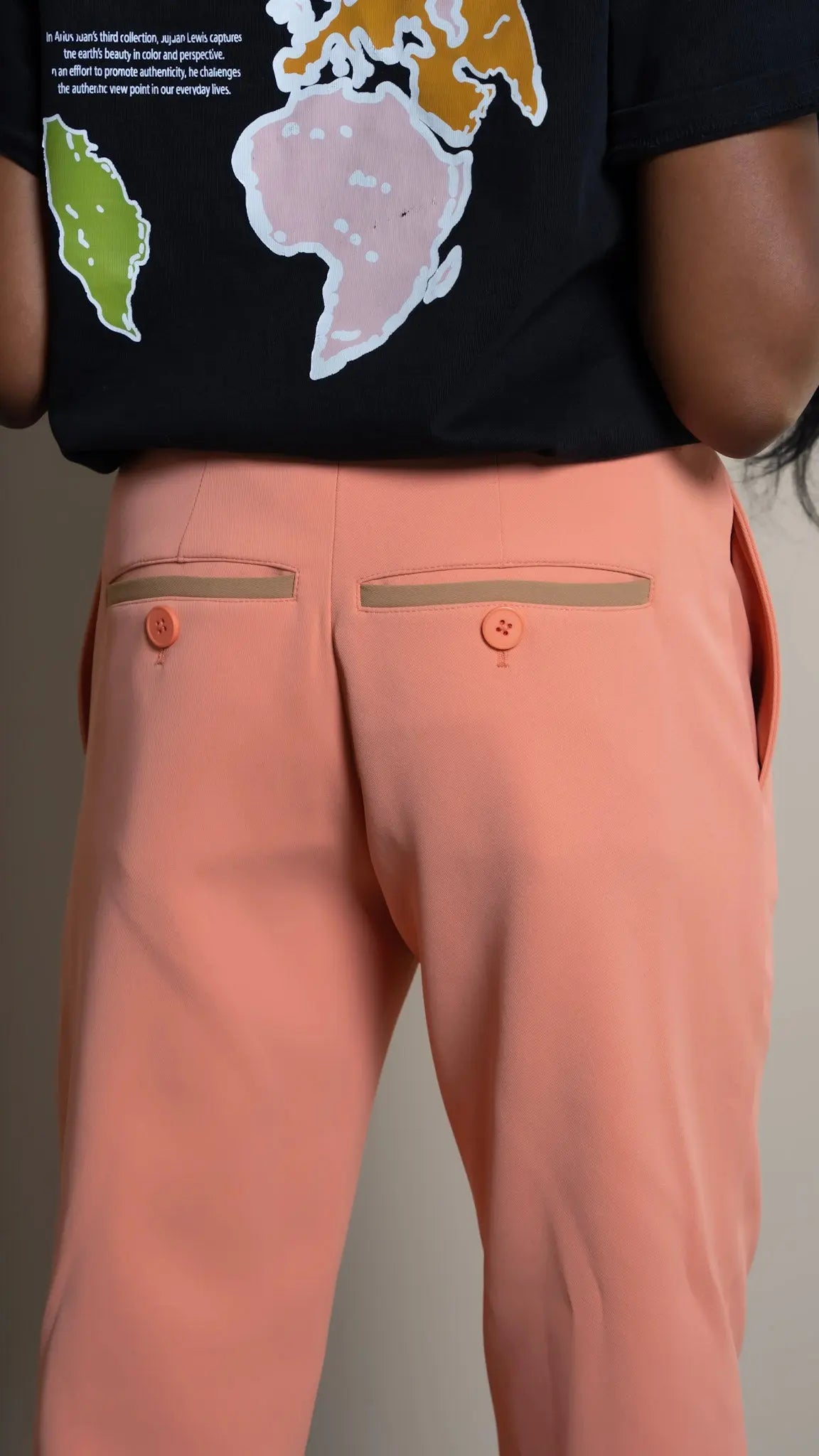 Photo of model in the Arius Juan Nature's Gift: Salmon Pink Pants posing for product picture.