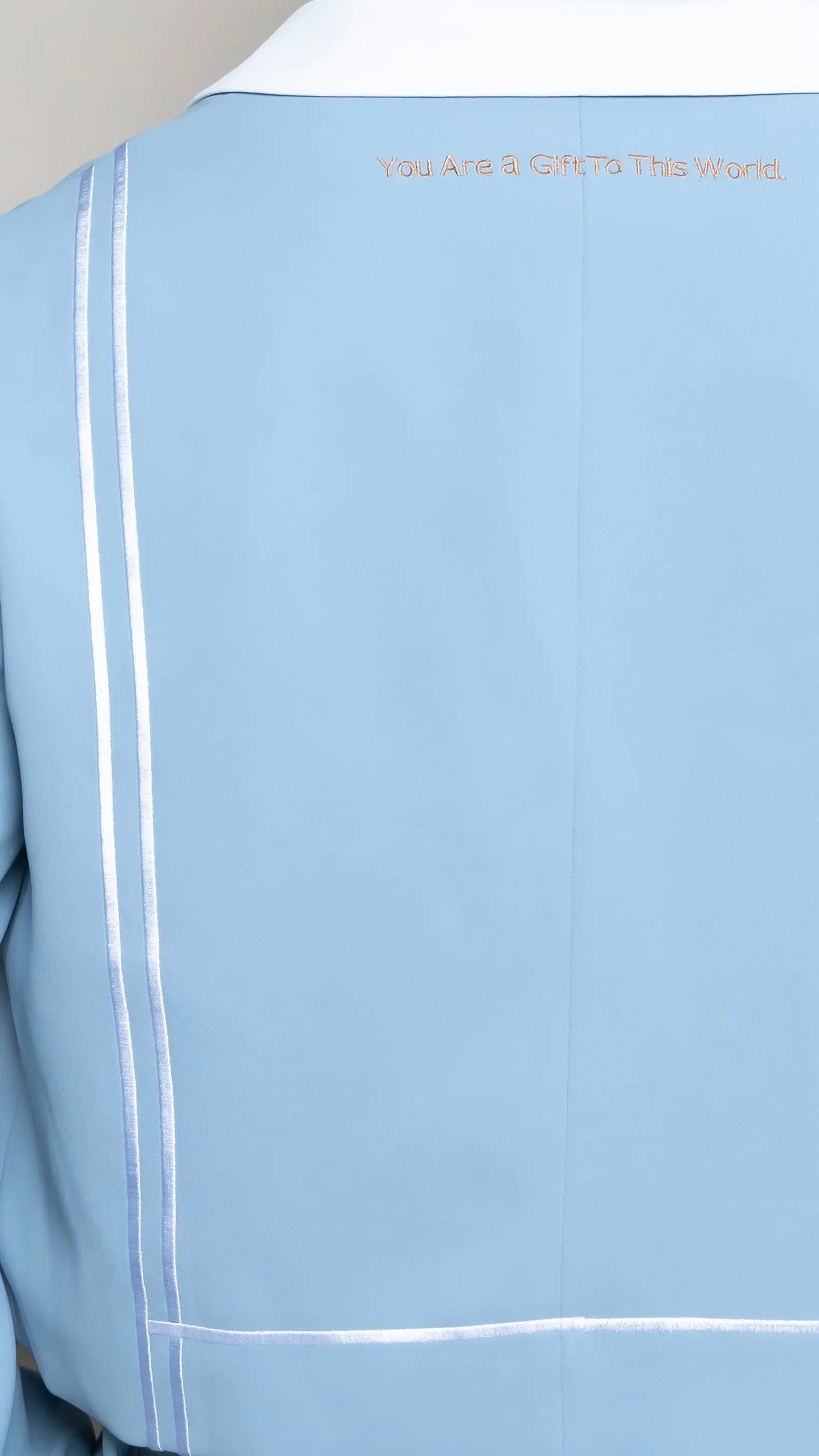 Photo of model in the Arius Juan Nature's Gift: Sky Blue Cropped Blazer posing for product picture.