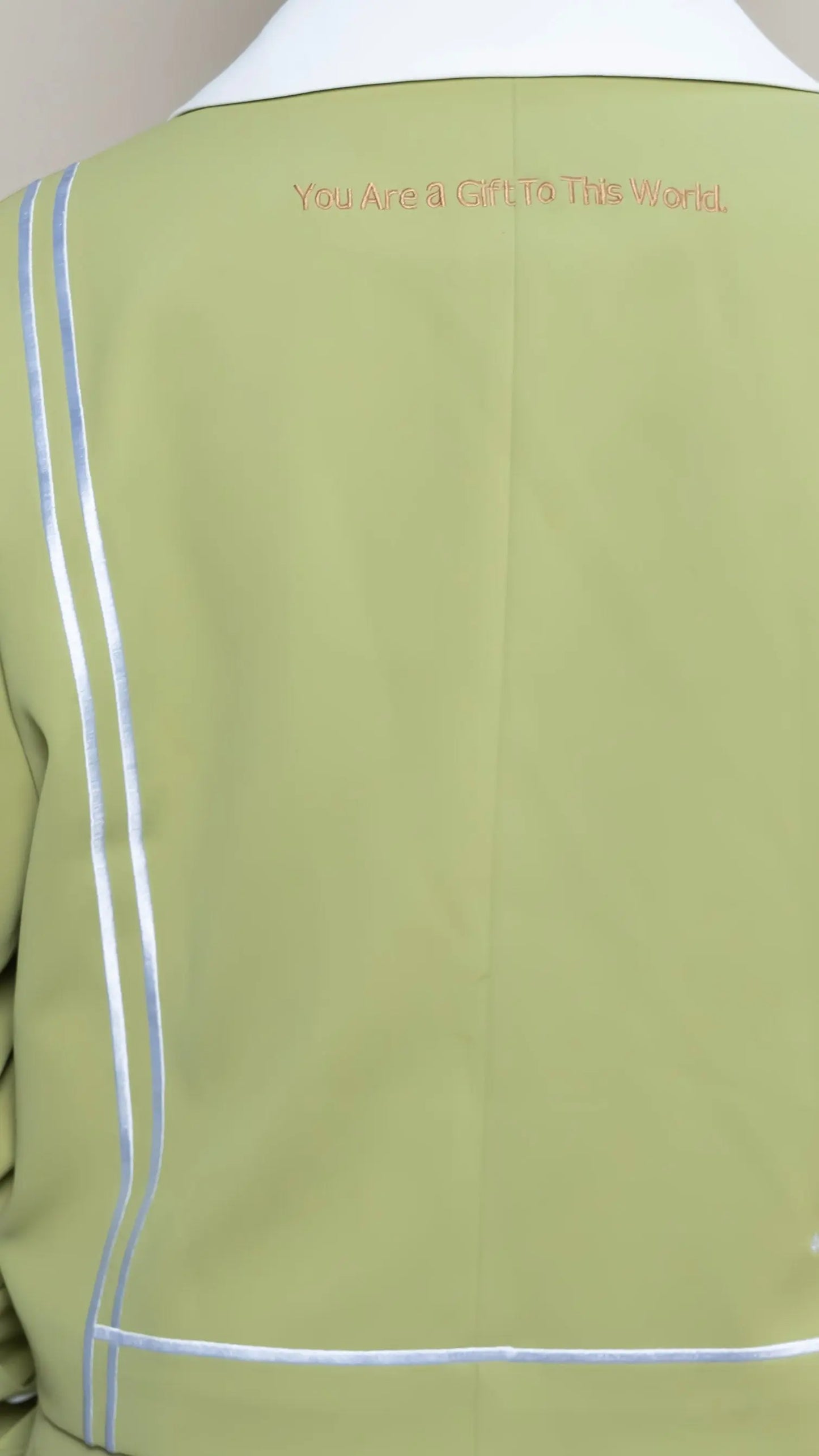 Photo of model in the Arius Juan Nature's Gift: Olive Green Cropped Blazer posing for product picture.