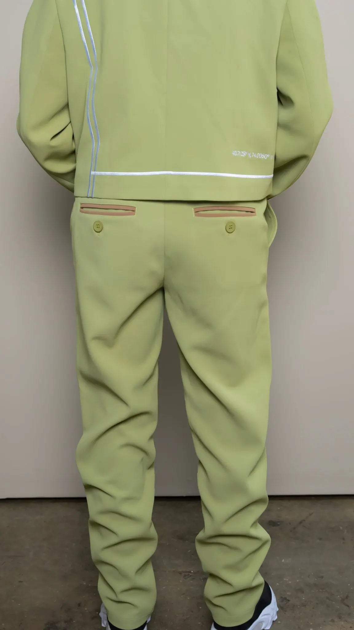 Photo of model in the Arius Juan Nature's Gift: Olive Green Pants posing for product picture.