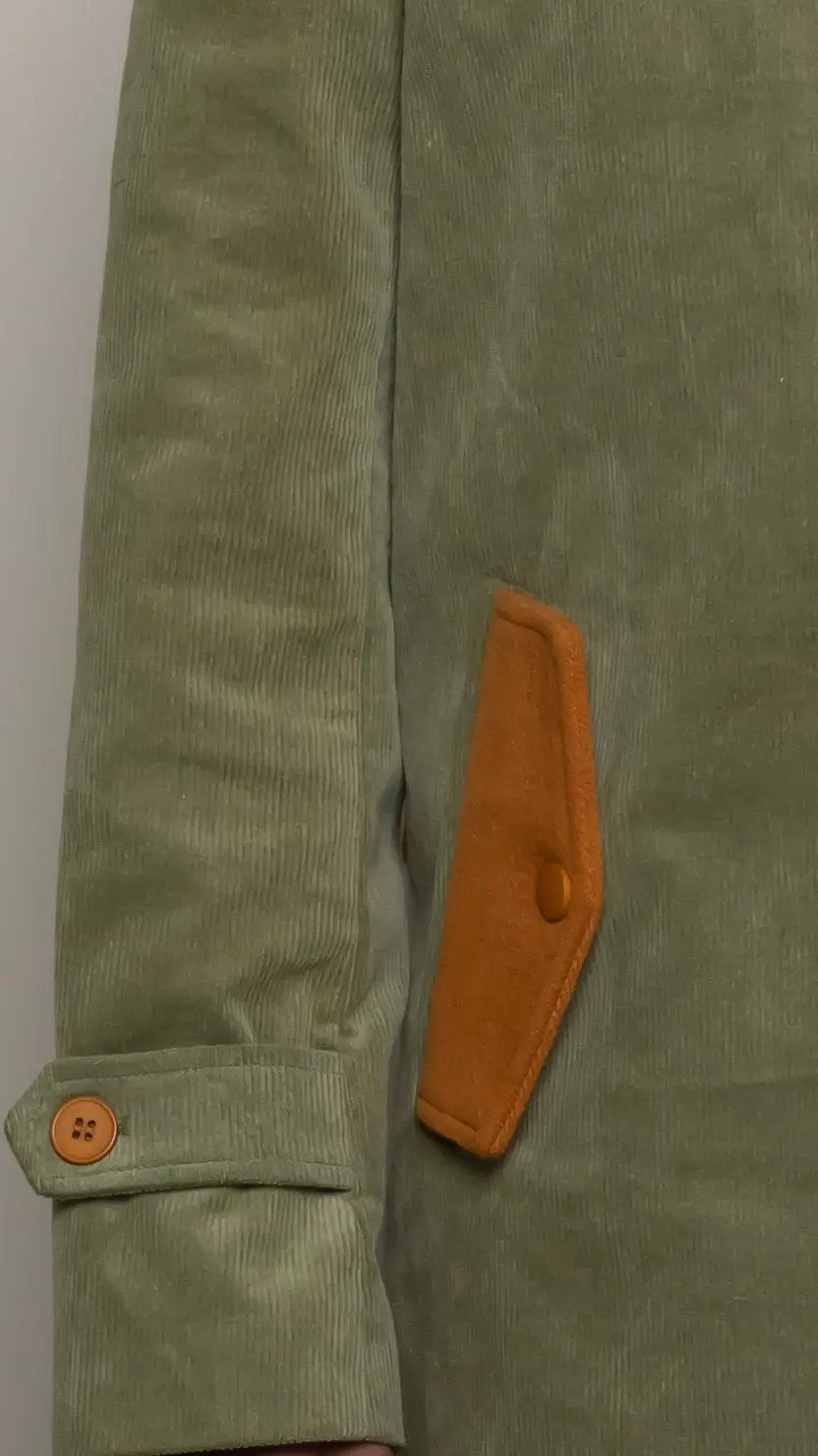 Photo of model in the Arius Juan Olive Green Earthly Trench Coat posing for product picture.