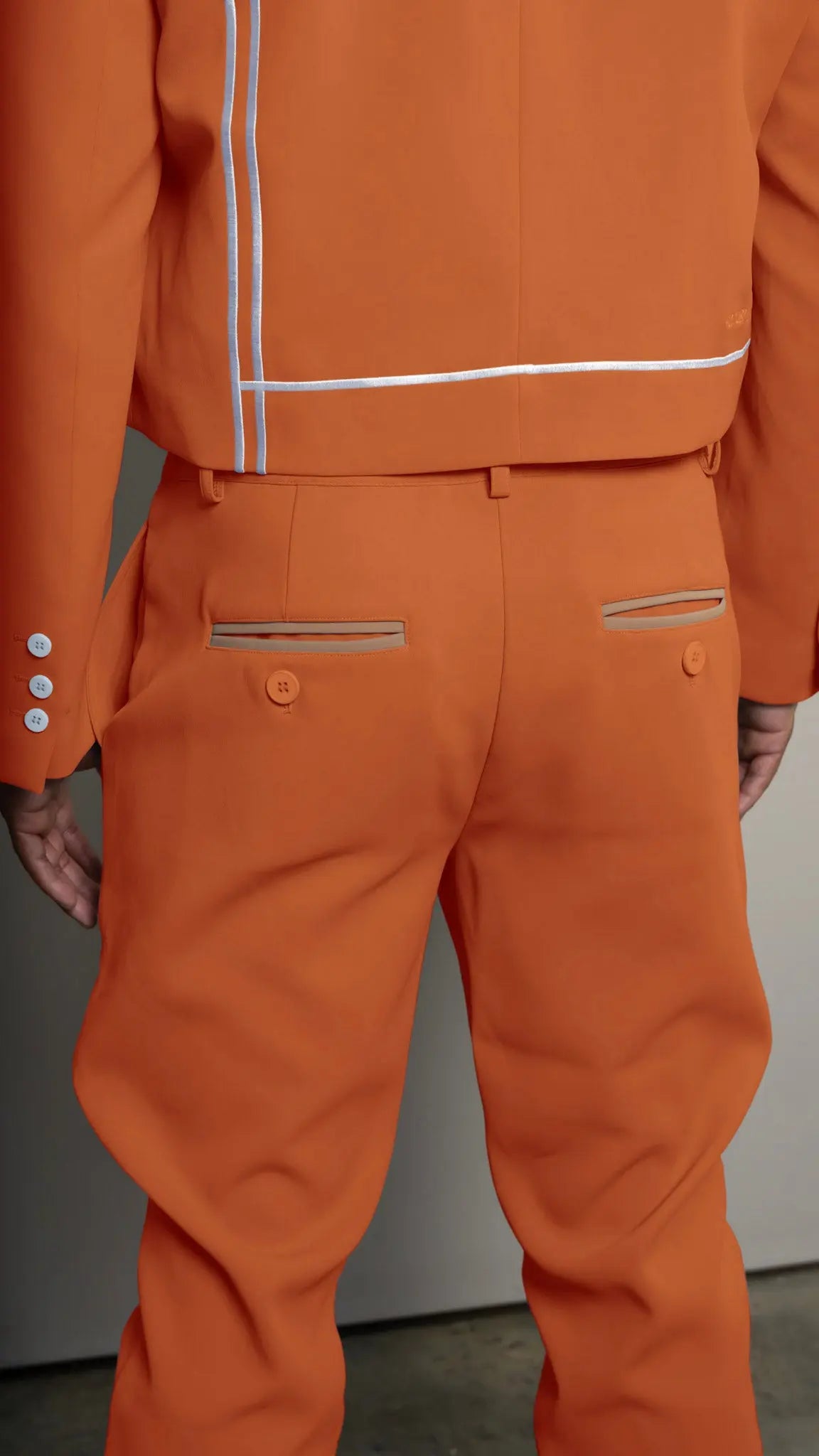 Photo of model in the Arius Juan Nature's Gift: Burnt Orange Pants posing for product picture.