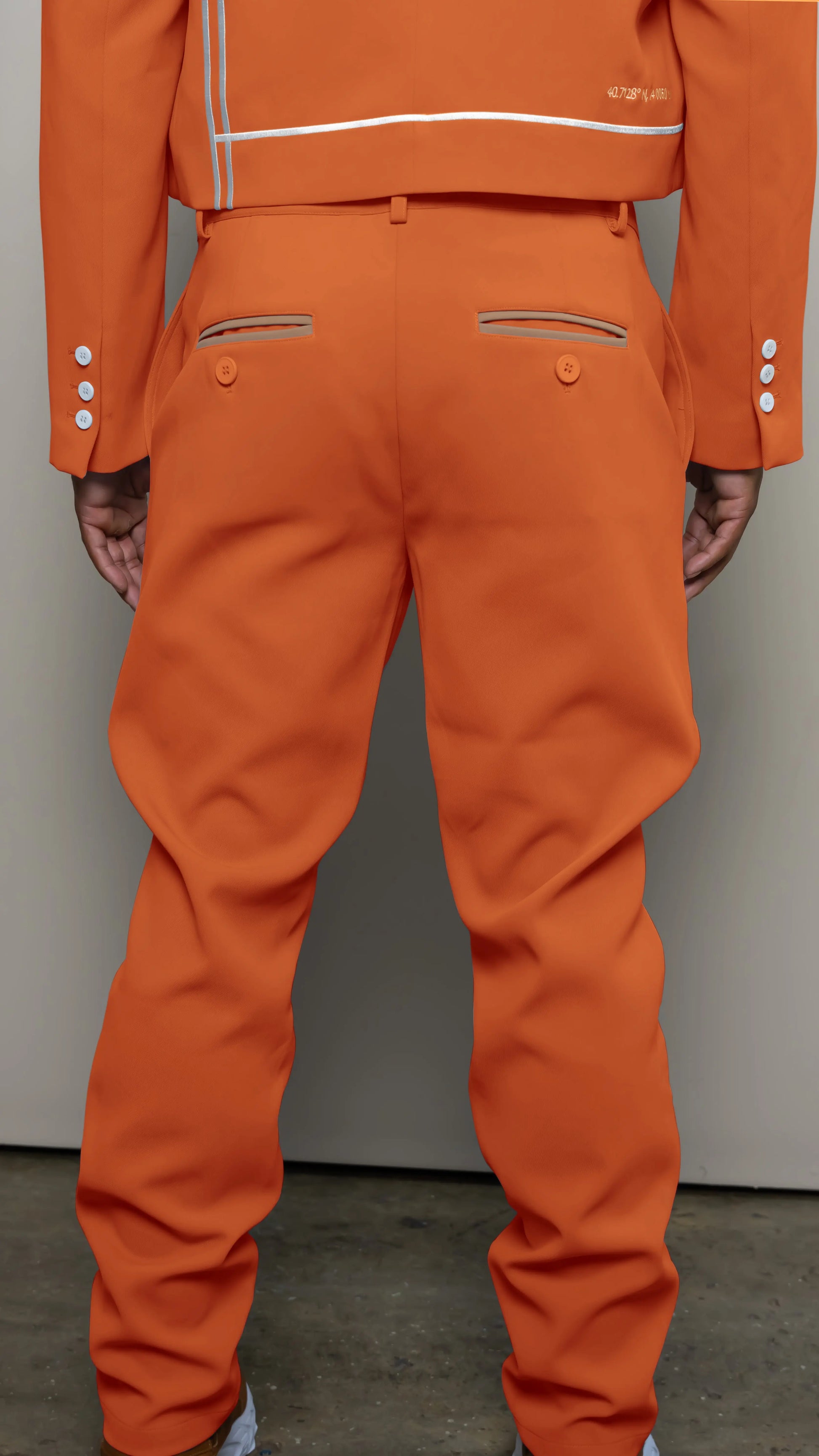 Photo of model in the Arius Juan Nature's Gift: Burnt Orange Pants posing for product picture.