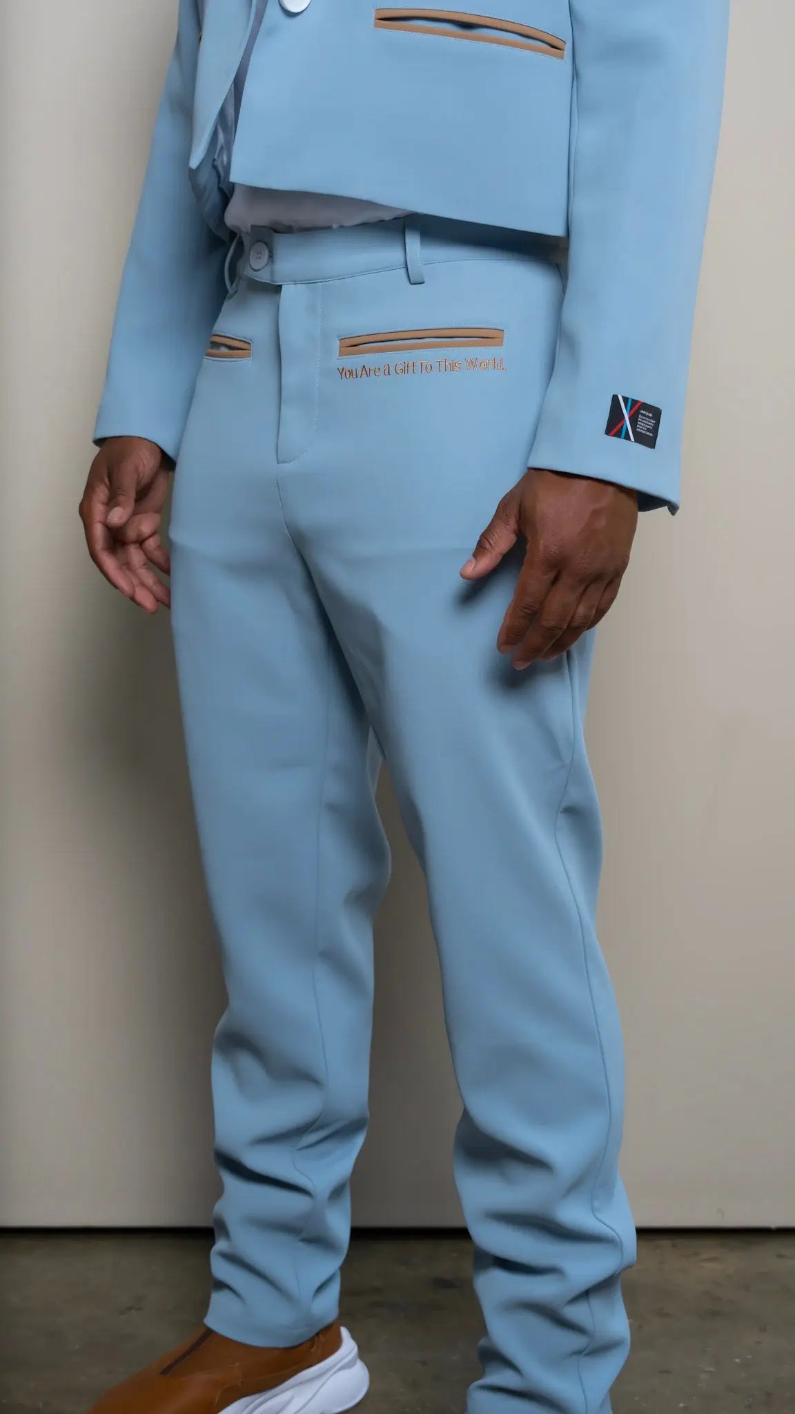 Photo of model in the Arius Juan Nature's Gift: Sky Blue Pants posing for product picture.