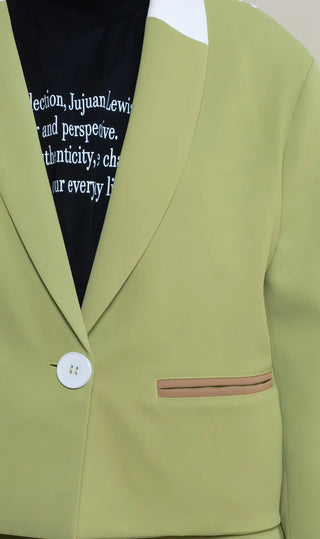 Photo of model in the Arius Juan Nature's Gift: Olive Green Cropped Blazer posing for product picture.