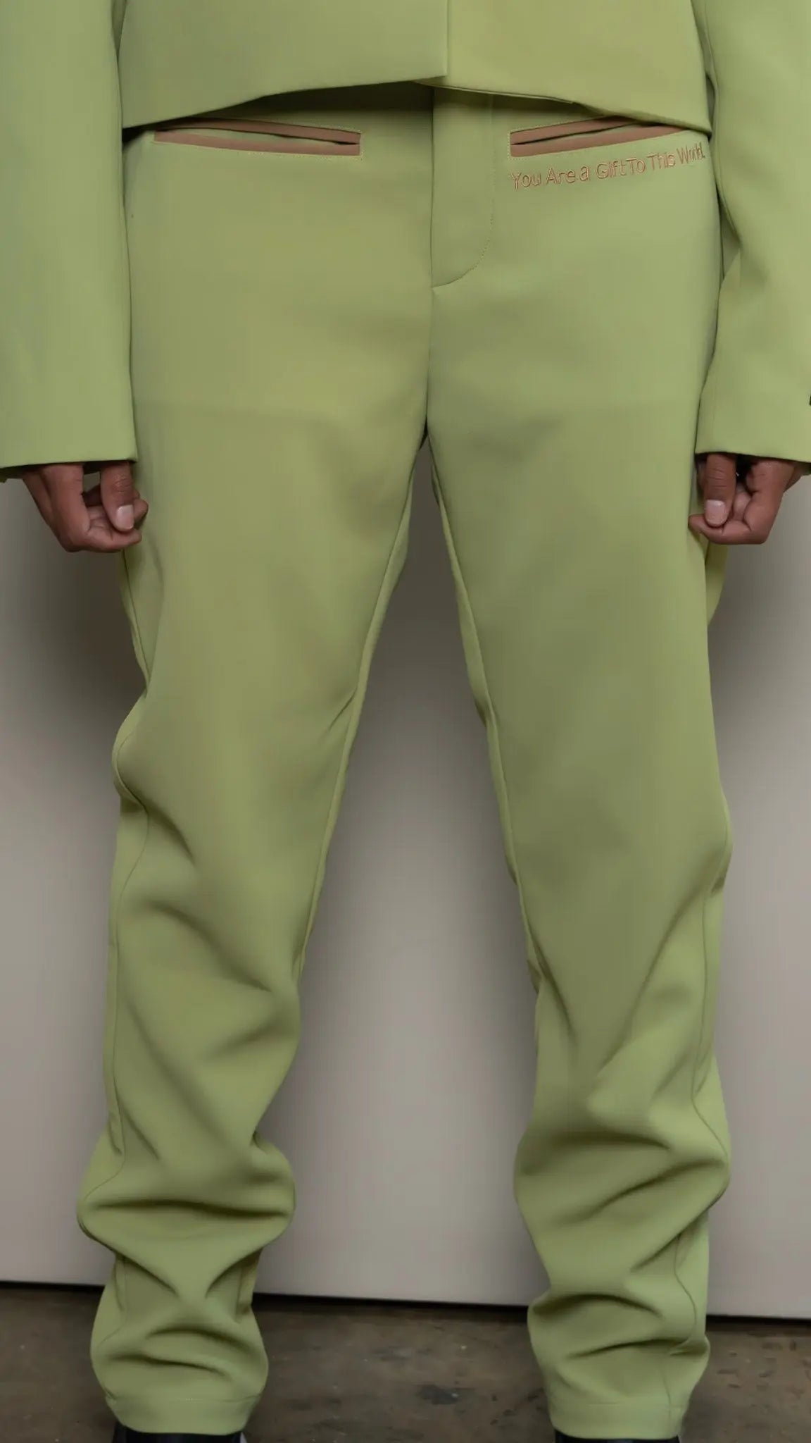 Photo of model in the Arius Juan Nature's Gift: Olive Green Pants posing for product picture.