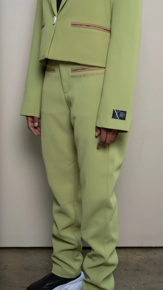 Photo of model in the Arius Juan Nature's Gift: Olive Green Pants posing for product picture.