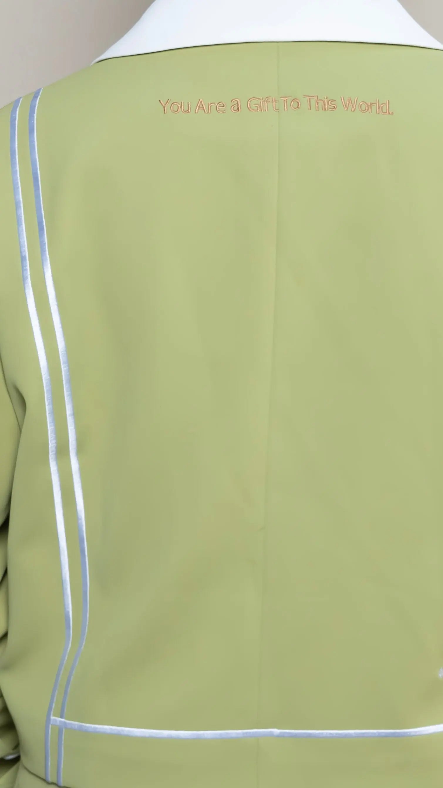 Photo of model in the Arius Juan Nature's Gift: Olive Green Cropped Blazer posing for product picture.